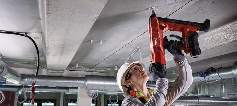 Pistol pentru implantat cuie pentru beton BX 4-ME-22 pe acumulator (ediția M&E) Pistol pentru implantat cuie pe acumulator Nuron pentru instalarea cablurilor, tuburilor de cabluri și bolțurilor filetate în beton, oțel și zidărie Aplicații 1
