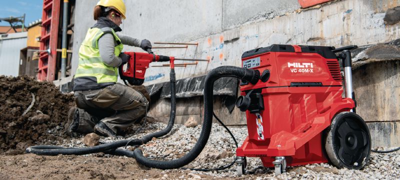Extractor de praf din clasa L VC 40L-X Aspirator puternic cu recipient de mare capacitate și mâner de împingere, care se atașează la unelte electrice pentru operațiuni de curățare pe șantier (în condiții umede și uscate), rezervor de 30 l Aplicații 1