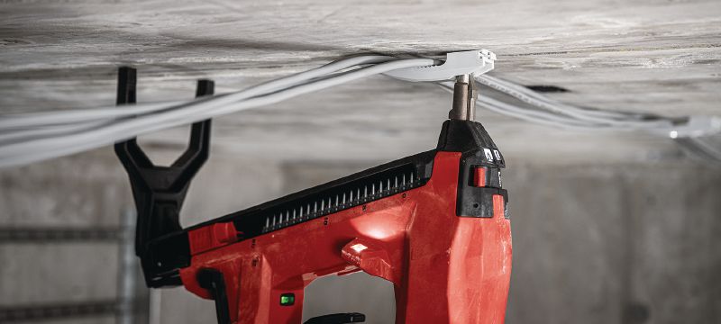 Pistol pentru implantat cuie pentru beton BX 4-ME-22 pe acumulator (ediția M&E) Pistol pentru implantat cuie pe acumulator Nuron pentru instalarea cablurilor, tuburilor de cabluri și bolțurilor filetate în beton, oțel și zidărie Aplicații 1